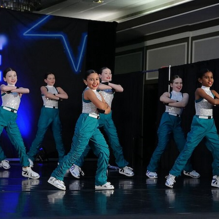 Hip Hop Company group in white and green costume
