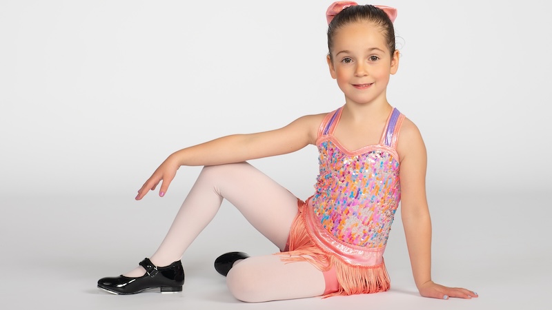 Young Tap Dancer In Coral Costume